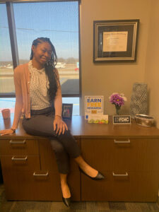 Haley Ellison in the office at her first bank manager job