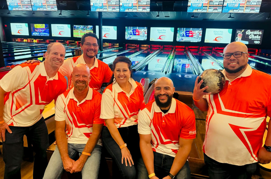 NDBT bowling team photo at Irving Cares event