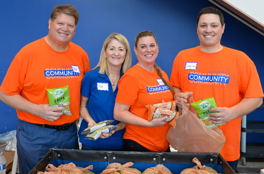 Group of NDBT bankers volunteering at food bank