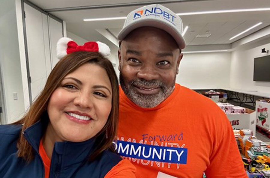 NDBT bankers smiling selfie at holiday volunteer event