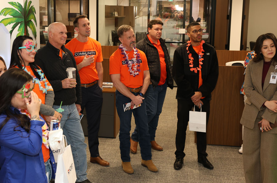 NDBT bankers listening to presentation at volunteer event