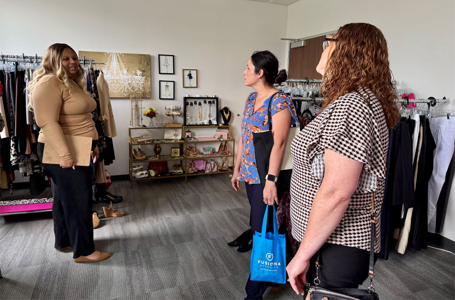 NDBT volunteers touring Interfaith Family Services facility