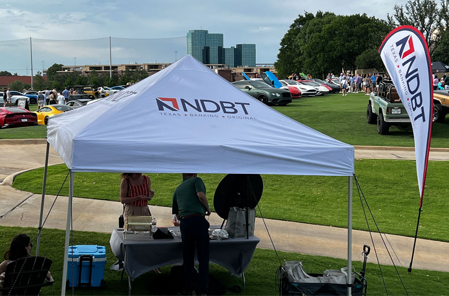 NDBT professionals greeting people at NDBT tent during Hoctane's Torque & Smoke event